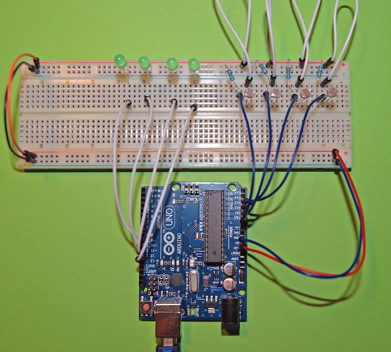 Arduino breadboard assembly - 4 photoresistors drive 4 LED's